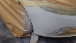 Witte bumper na reparatie